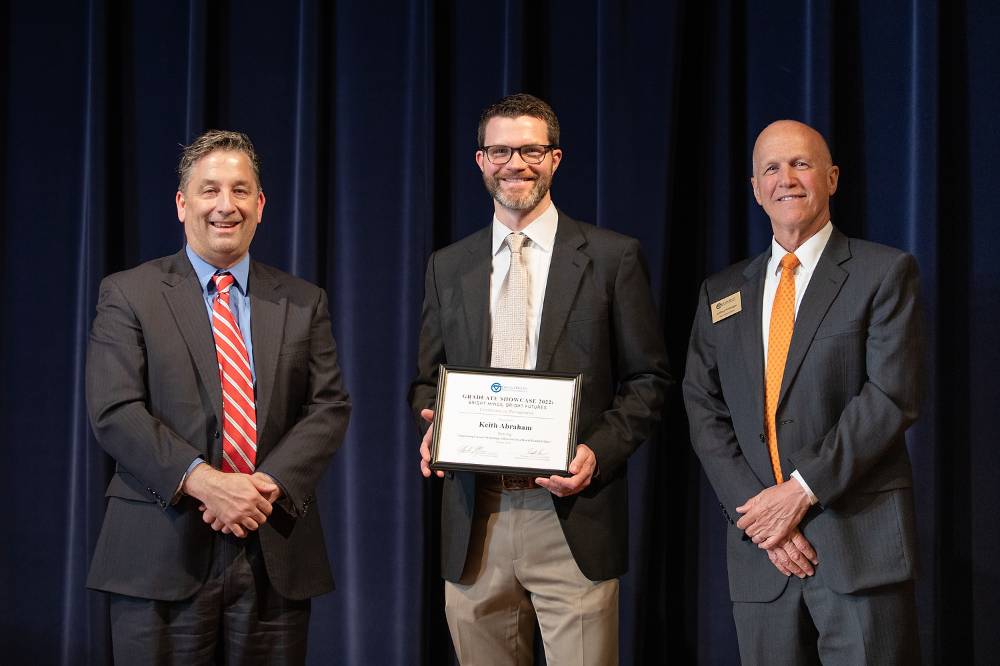 Dr. Robert Smart, Vice Provost of Research Administration and Scholarship (left), Keith Abraham (middle), and Dr. Jeffrey Potteiger, Associate Vice-Provost of The Graduate School (right).